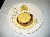 A crab cake with bearnaise sauce at Bogey's restaurant in De funiak springs florida.